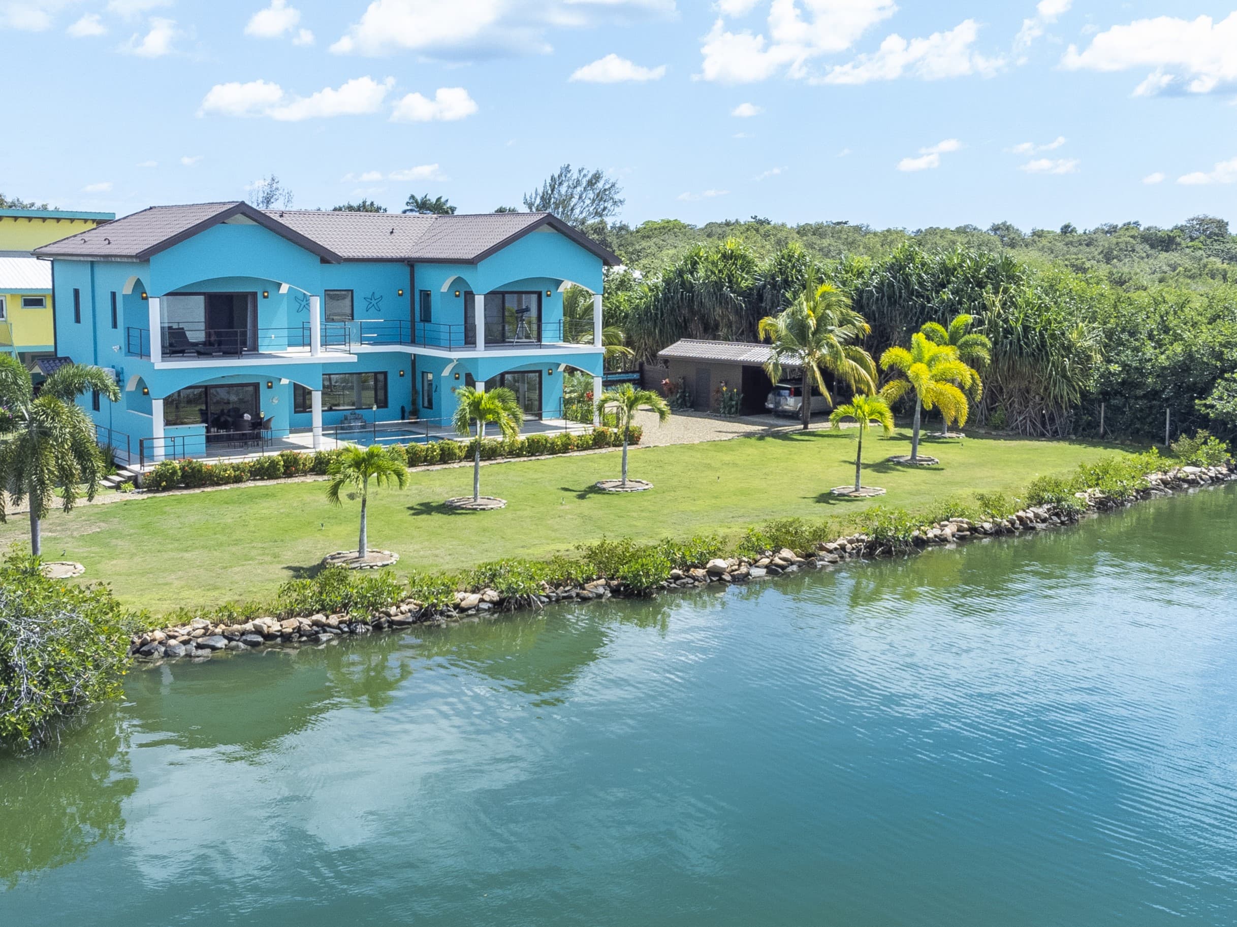 Lagoon Front Marina Home Placencia Peninsula — photo 1 of 30