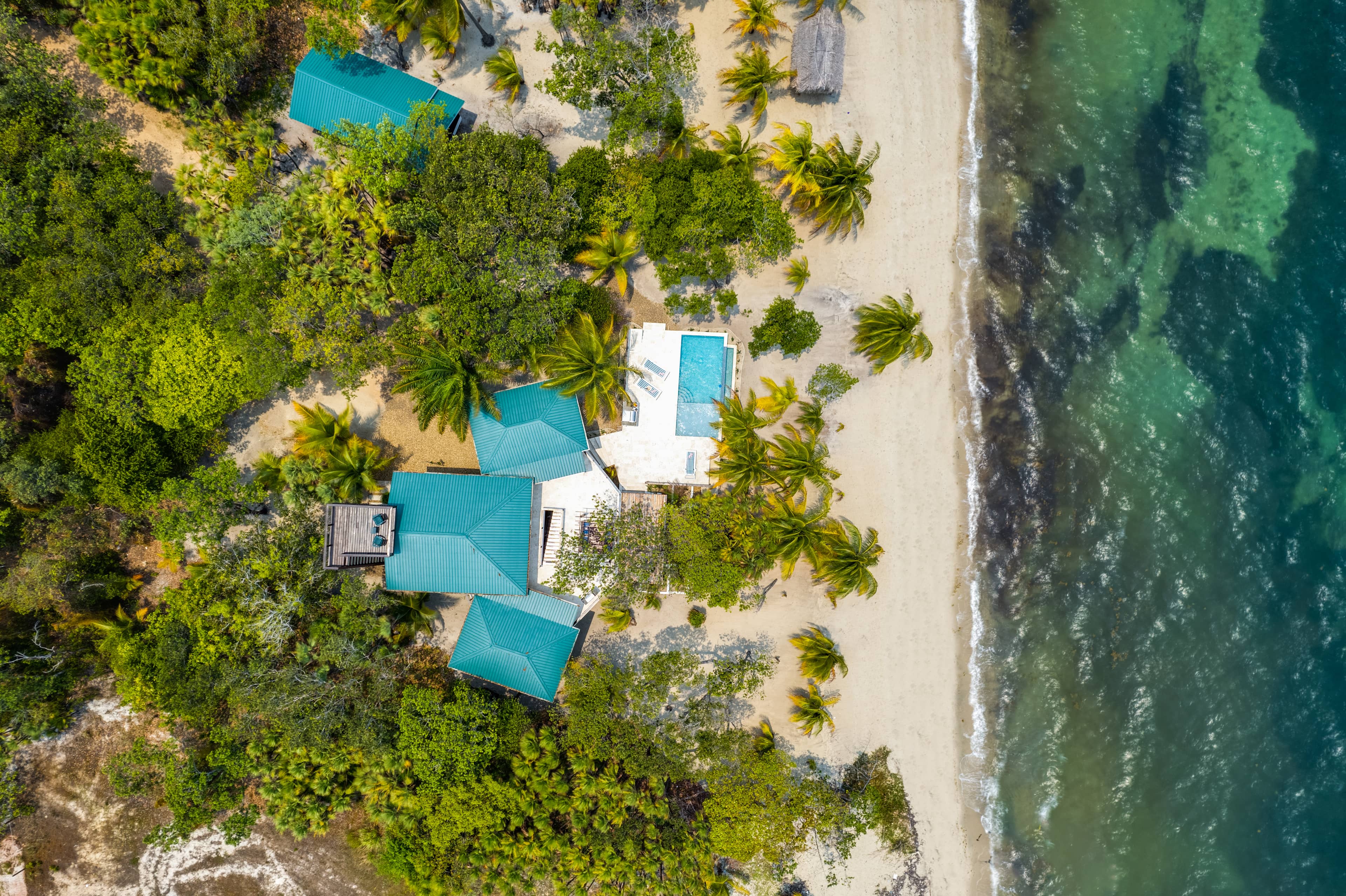“Private 1-acre Luxury Beachfront Estate with Expansion Potential” — Placencia, Belize