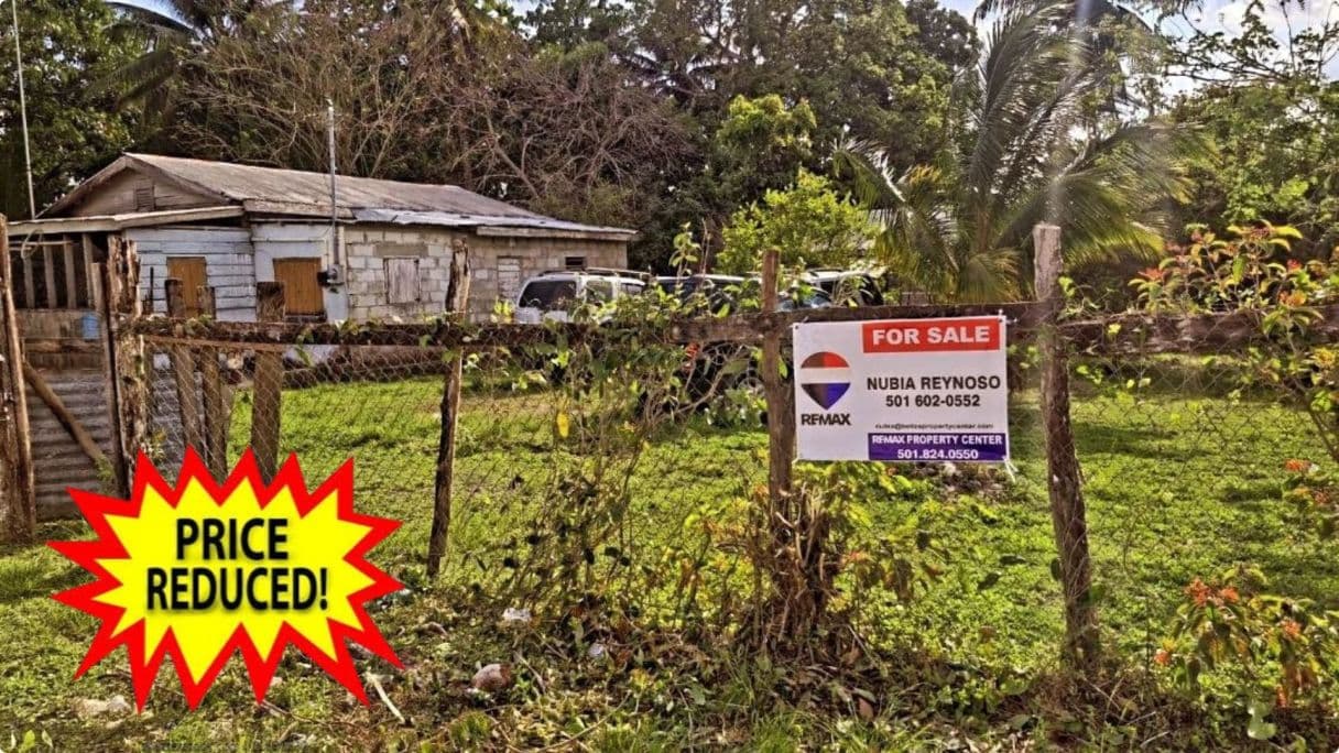 Listing 3003 – Corner Lot Fixer-Upper with Two Structures – Carmelita Village, Orange Walk District — photo 1 of 14