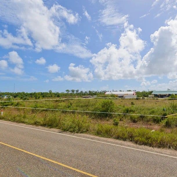 F1003: Commercial Acreage Lots Near Busy Highway — photo 1 of 4