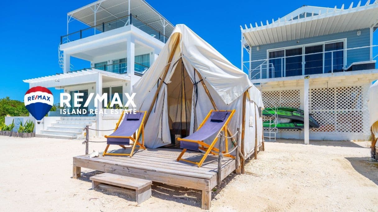 Belize Investment Opportunity: Secluded Beachfront Retreat with Rental Income — photo 1 of 34